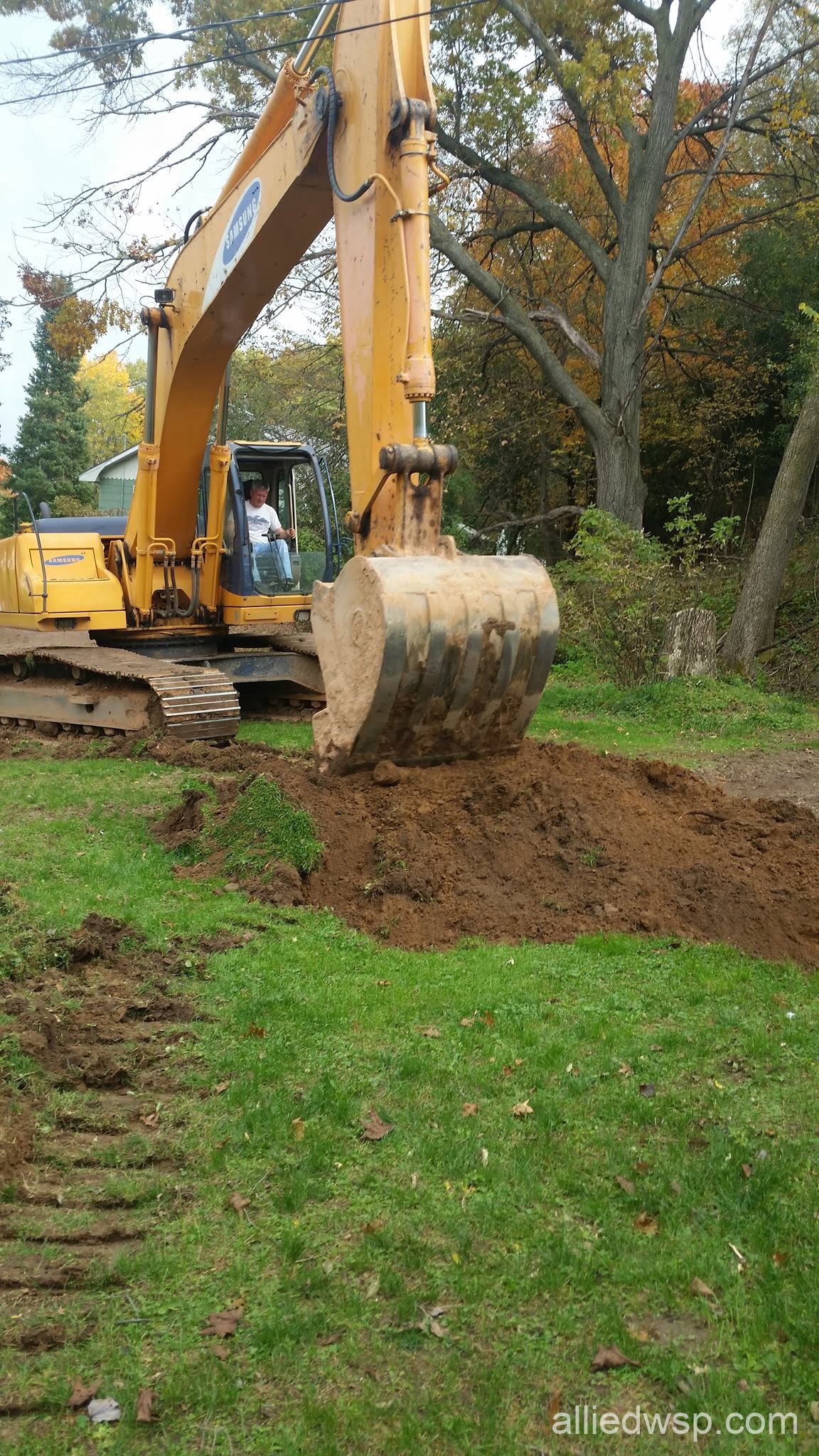 septic system tank hole digging begins