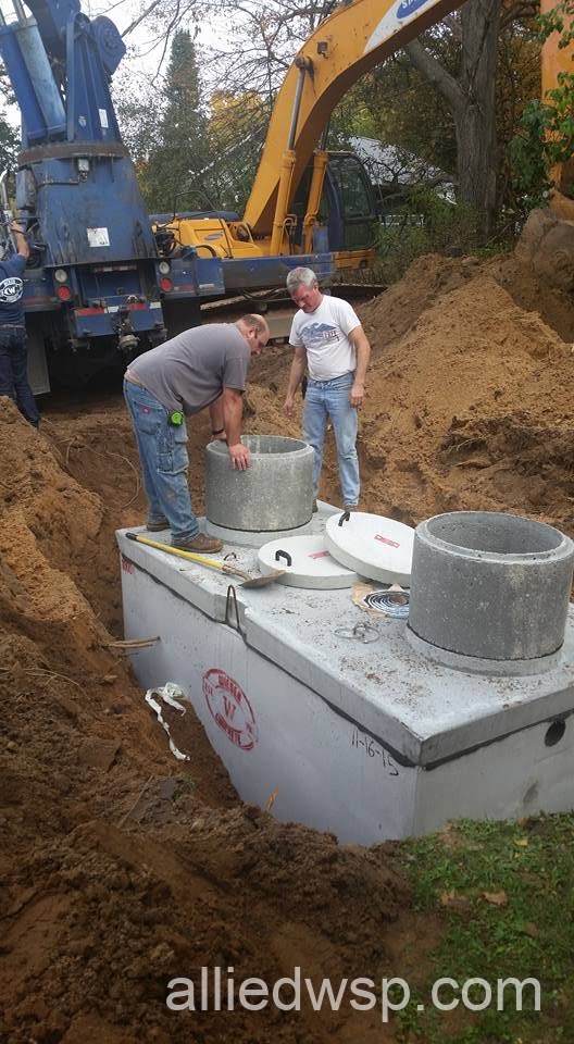 septic system tank riser installed